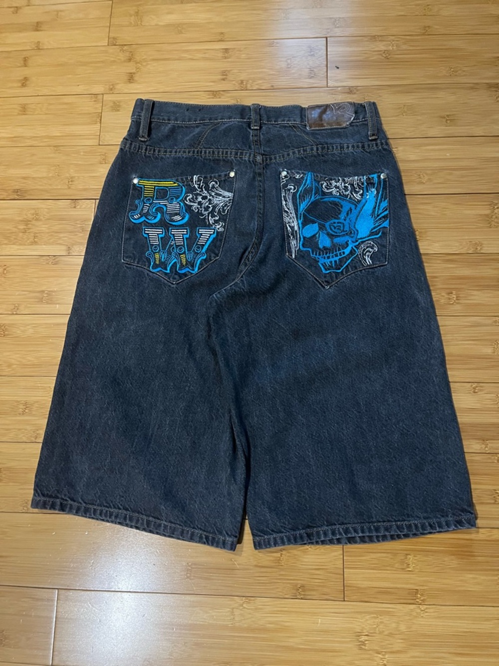 JNCO Black Denim Shorts with Blue Embroidered Skull & Monogram Pockets